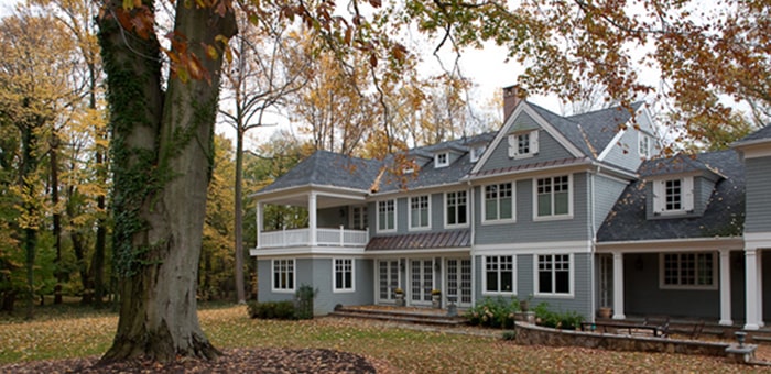 LeafGuard gutters shown on a country estate home