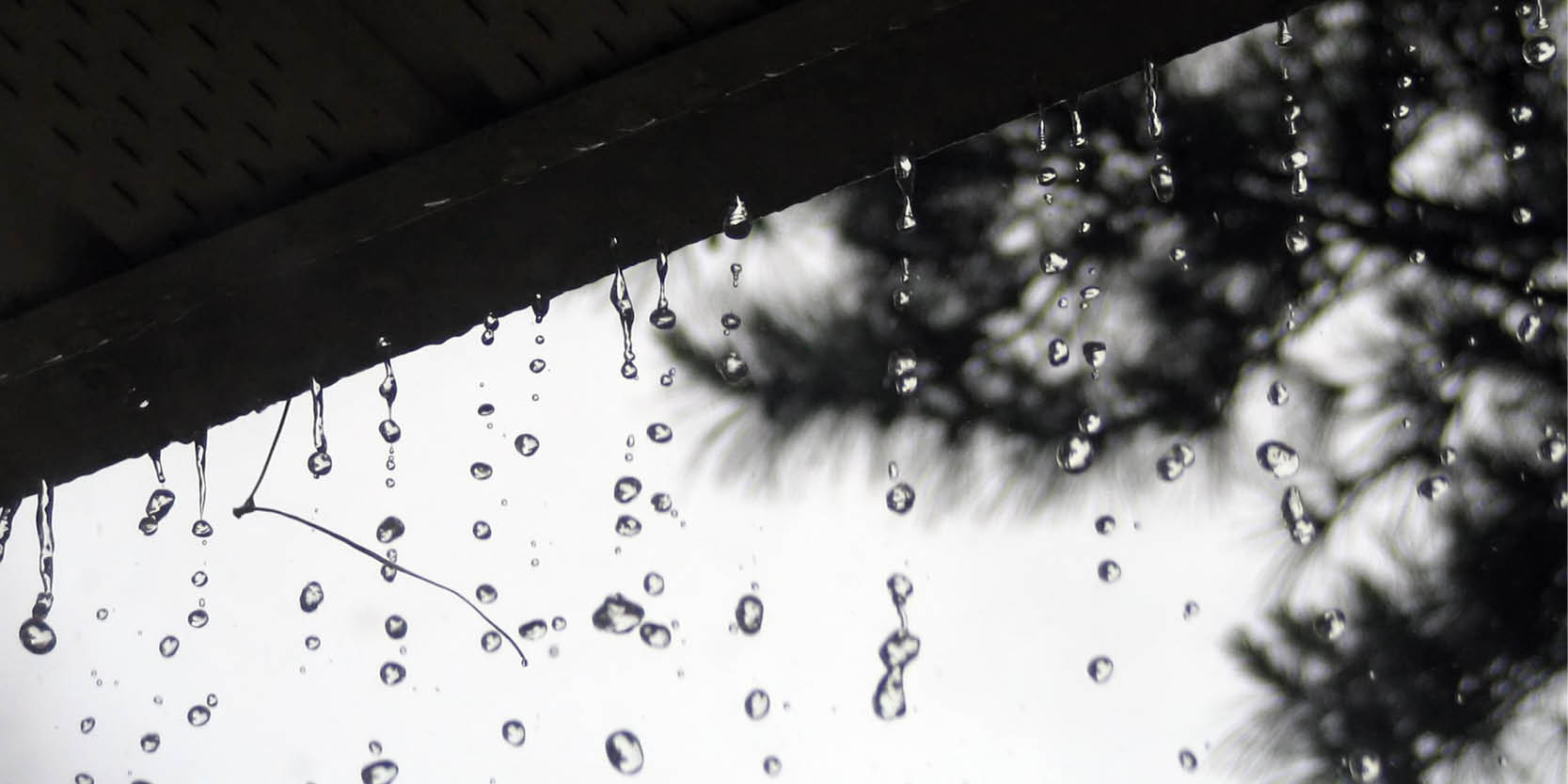 Water overflowing a gutter